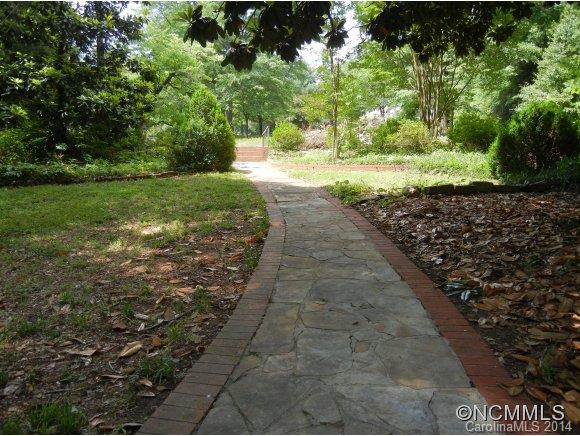 355 South Ridgecrest Street Rutherfordton, NC 28139 - Photo 24 of 24 a view of a yard with plants
