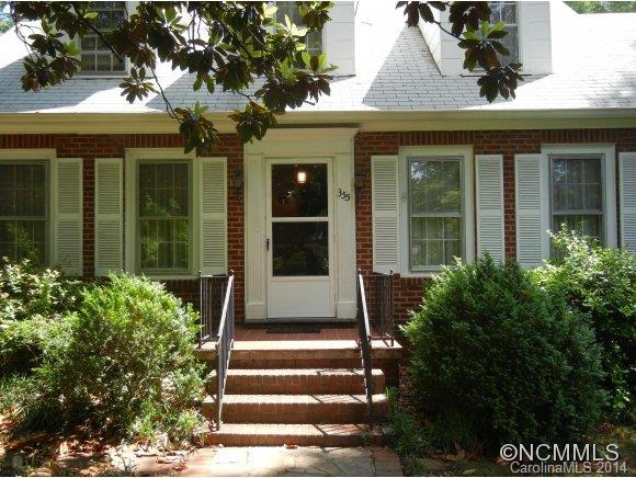 355 South Ridgecrest Street Rutherfordton, NC 28139 - Photo 6 of 24 a front view of a house with a garden