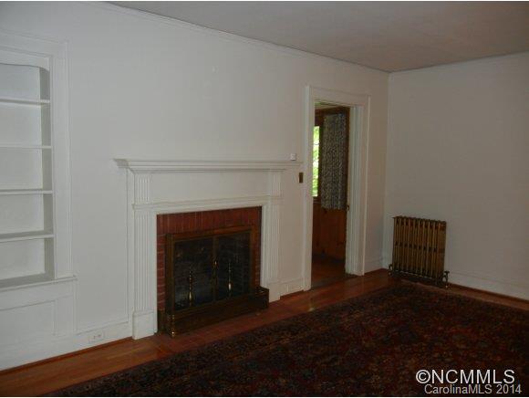 355 South Ridgecrest Street Rutherfordton, NC 28139 - Photo 10 of 24 a living room with a fireplace