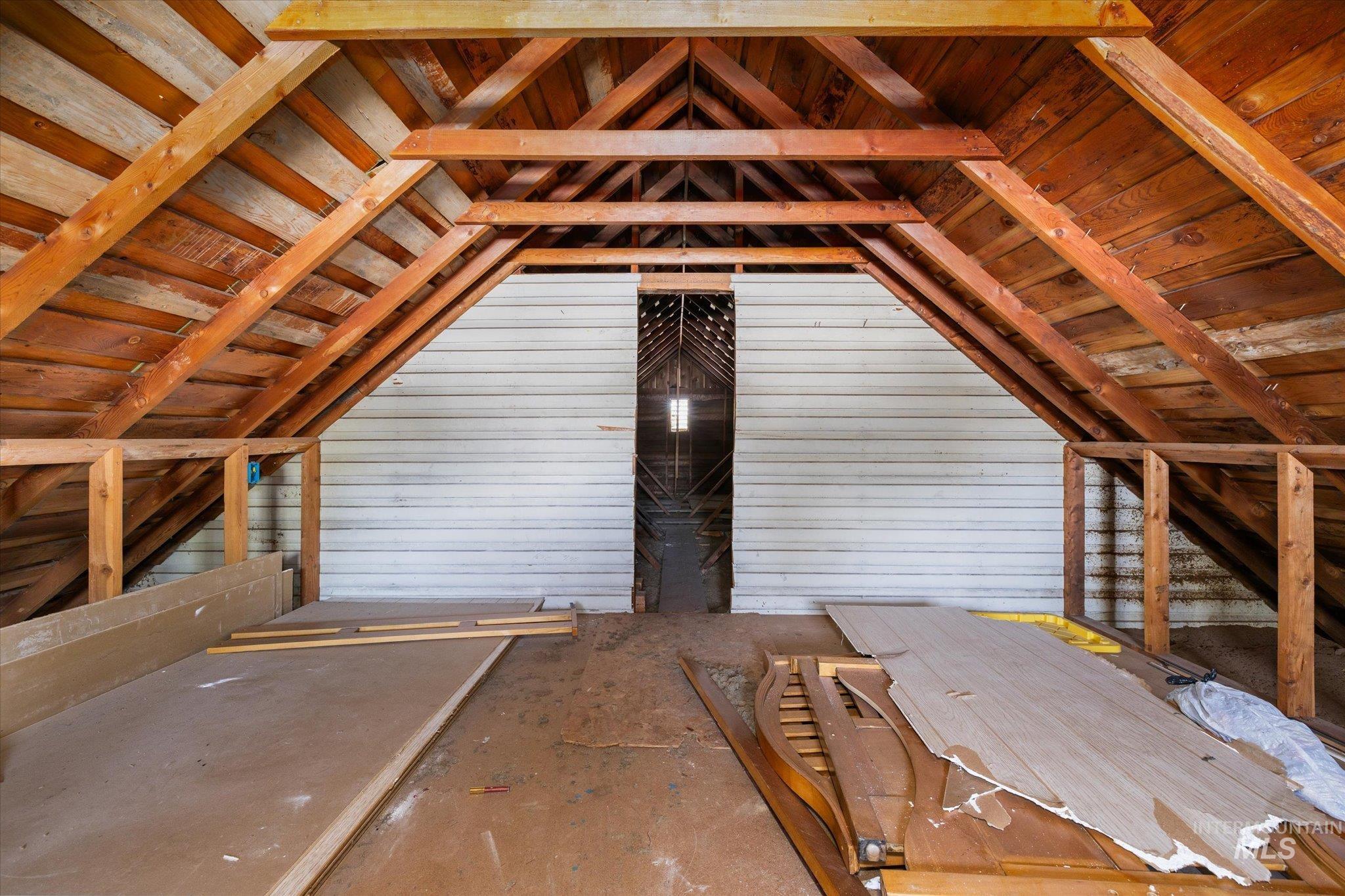 918 West 3rd Street Weiser, ID 83672 - Photo 23 of 36 Vaulted ceiling with exposed wood beams