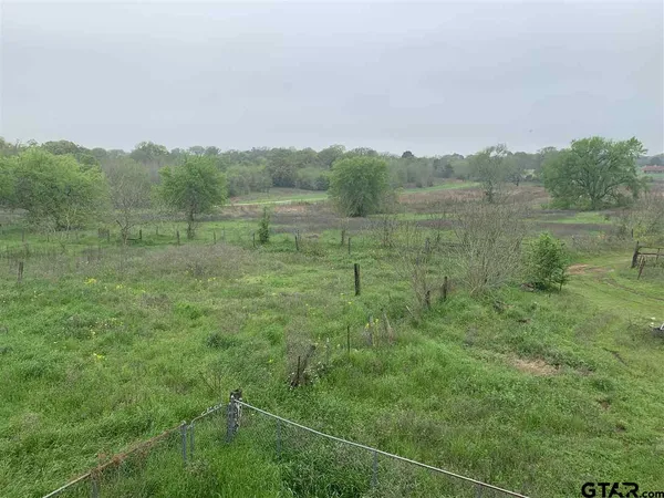 a view of an outdoor space and a yard