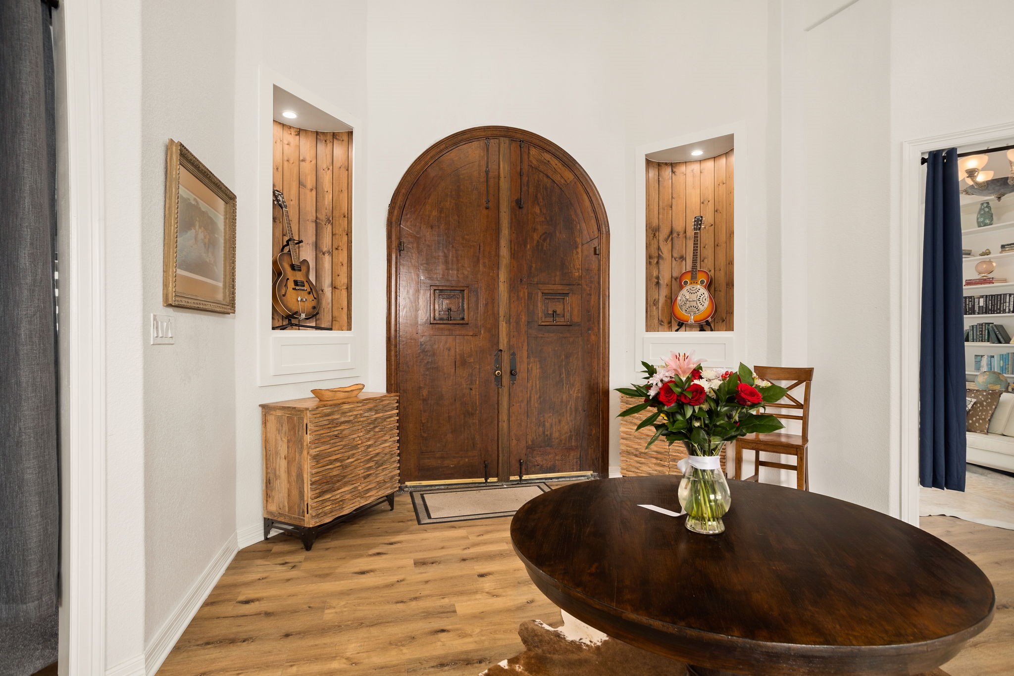 10210 Stidham Road Conroe, TX 77302 - Photo 11 of 39 a dining room with furniture and wooden floor