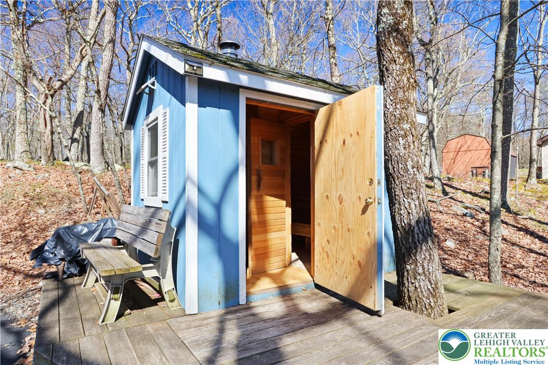 214 Mockingbird Court Bushkill, PA 18324 - Photo 21 of 40 a view of a house with a door and wooden floor