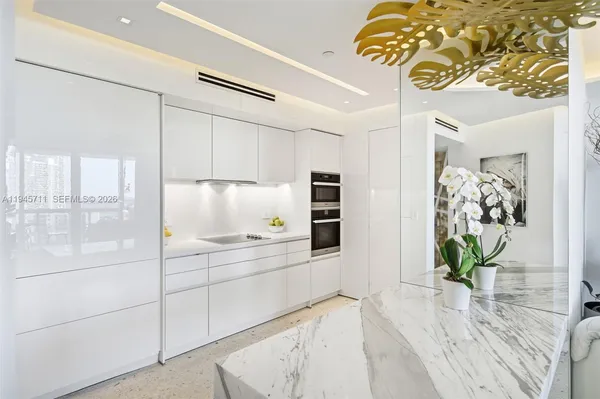 a view of a kitchen with a window