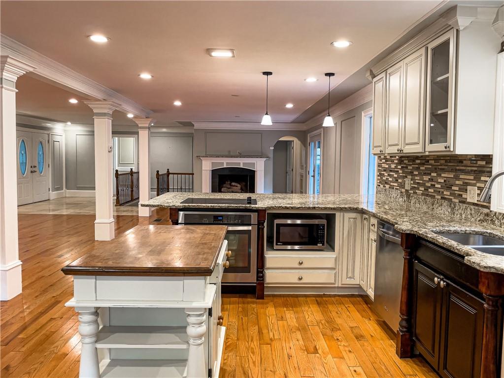 3115 Brookview Road Marietta, GA 30067 - Photo 15 of 31 a kitchen with stainless steel appliances granite countertop a stove and a sink