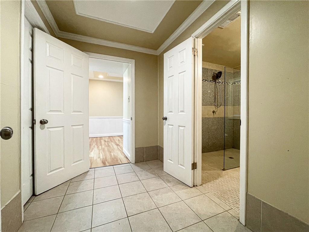 3115 Brookview Road Marietta, GA 30067 - Photo 17 of 31 a bathroom with a glass door shower and a sink