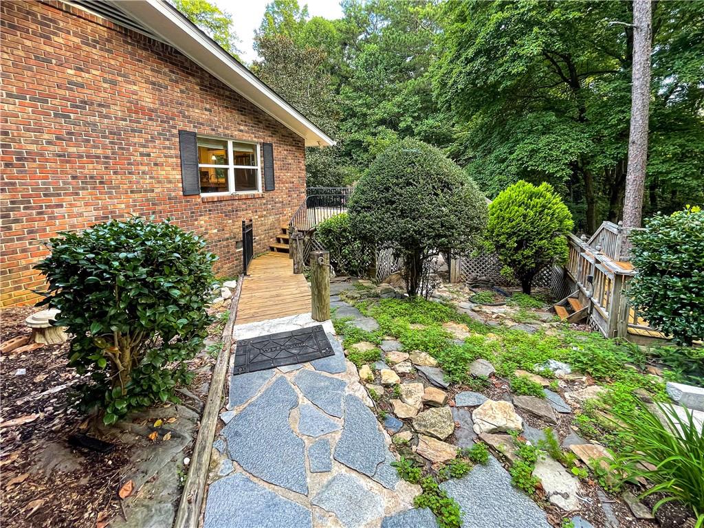 3115 Brookview Road Marietta, GA 30067 - Photo 30 of 31 a front view of a house with garden
