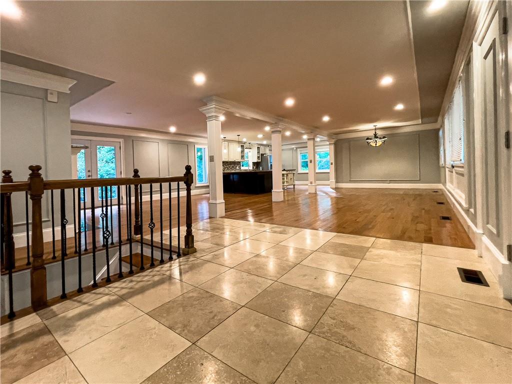 3115 Brookview Road Marietta, GA 30067 - Photo 4 of 31 a view of a hall with a couch and a potted plant