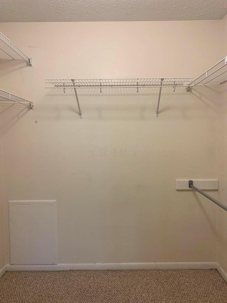2188 Hedgerow Road, Unit 2188G Columbus, OH 43220 - Photo 17 of 26 Second bedroom closet 3