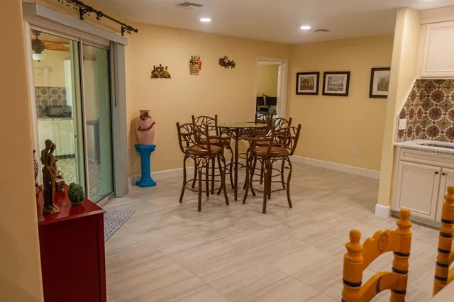 a bathroom with a sink a mirror and a shower
