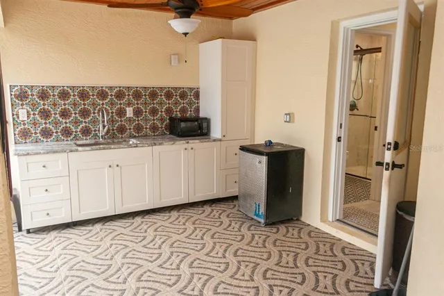 a view of a workspace with furniture