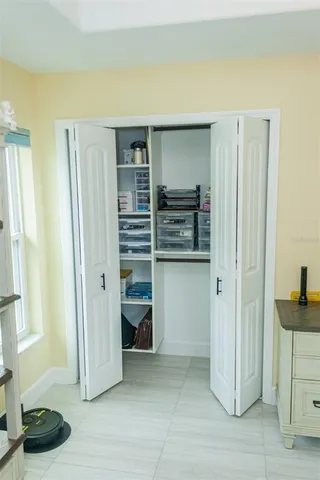 a bathroom with a sink mirror and vanity