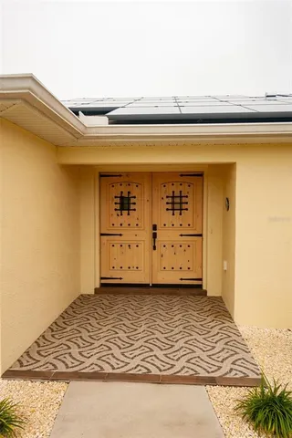 a room with furniture and a large window