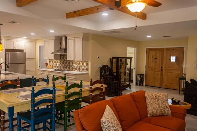 a group of people sitting in a living room