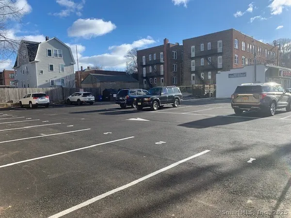 a view of a street with cars