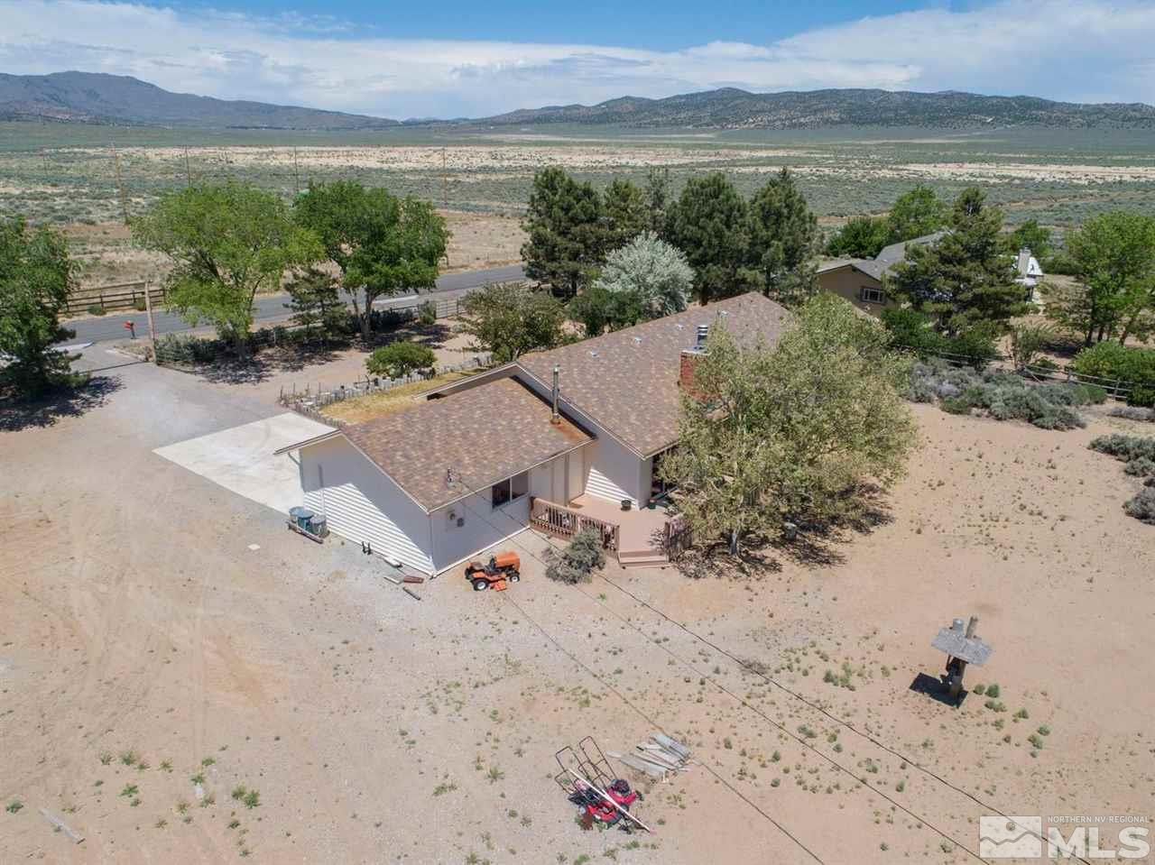 10180 Placerville Road Reno, NV 89508 - Photo 24 of 25 an aerial view of a house with a yard