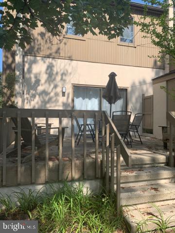 761 Salt Pond Road, Unit A Bethany Beach, DE 19930 - Photo 15 of 16 a view of swimming pool with outdoor seating
