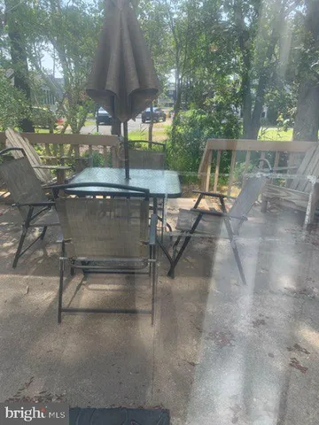a table and chairs in the patio