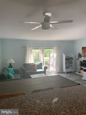 a view of livingroom with furniture and window