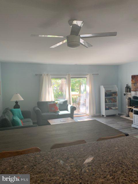 761 Salt Pond Road, Unit A Bethany Beach, DE 19930 - Photo 8 of 16 a view of livingroom with furniture and window