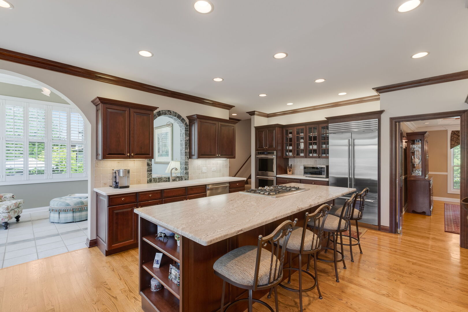 209 Carriage Trail Barrington, IL 60010 - Photo 13 of 42 a view of a dining room with furniture and wooden floor
