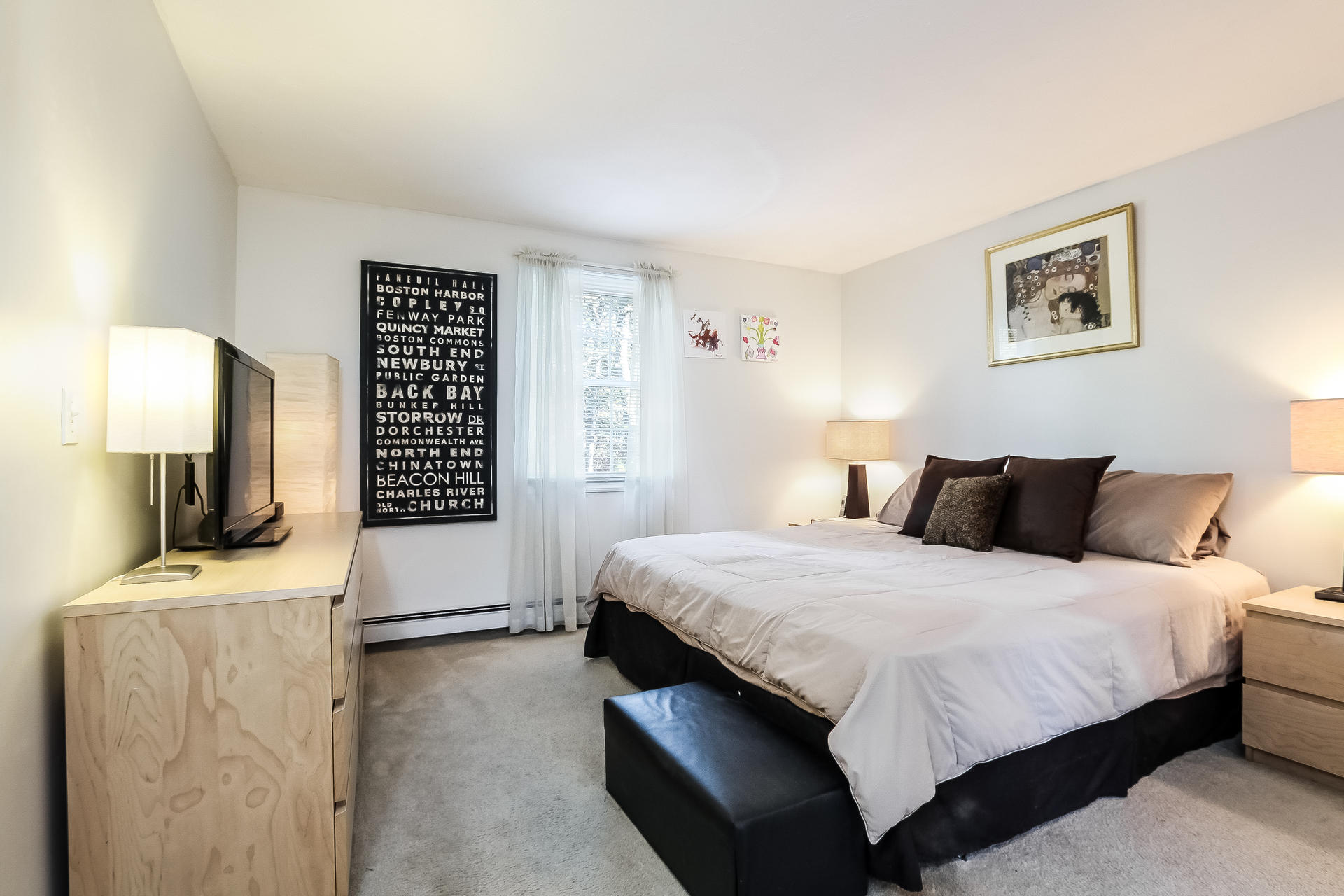 9 Wintergreen Road Mashpee, MA 02649 - Photo 14 of 24 a bedroom with a bed and a flat screen tv