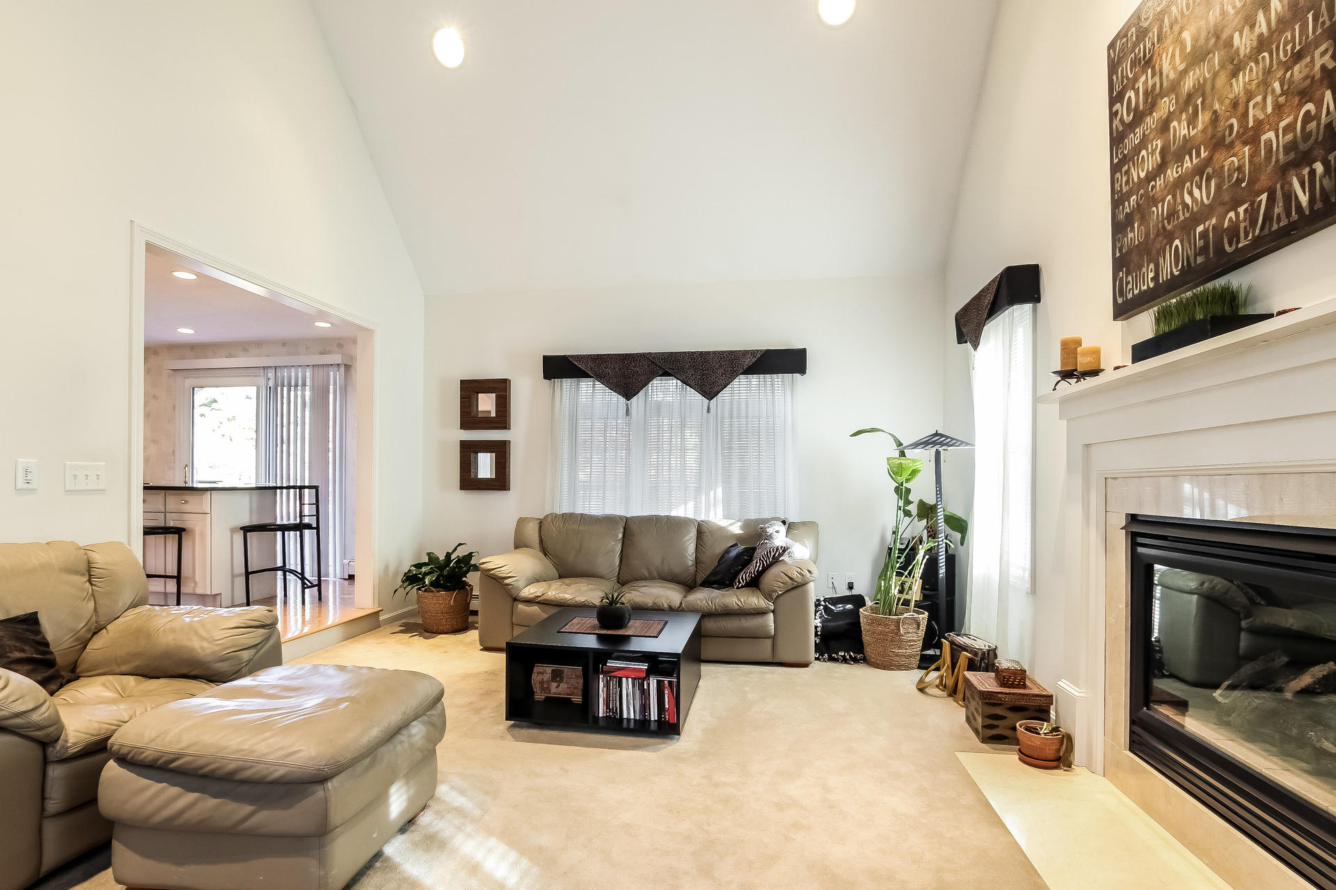 9 Wintergreen Road Mashpee, MA 02649 - Photo 10 of 24 a living room with furniture and a fireplace