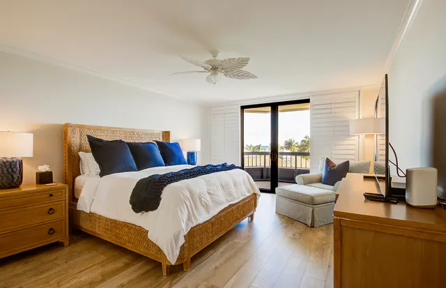 a bedroom with a bed and dresser