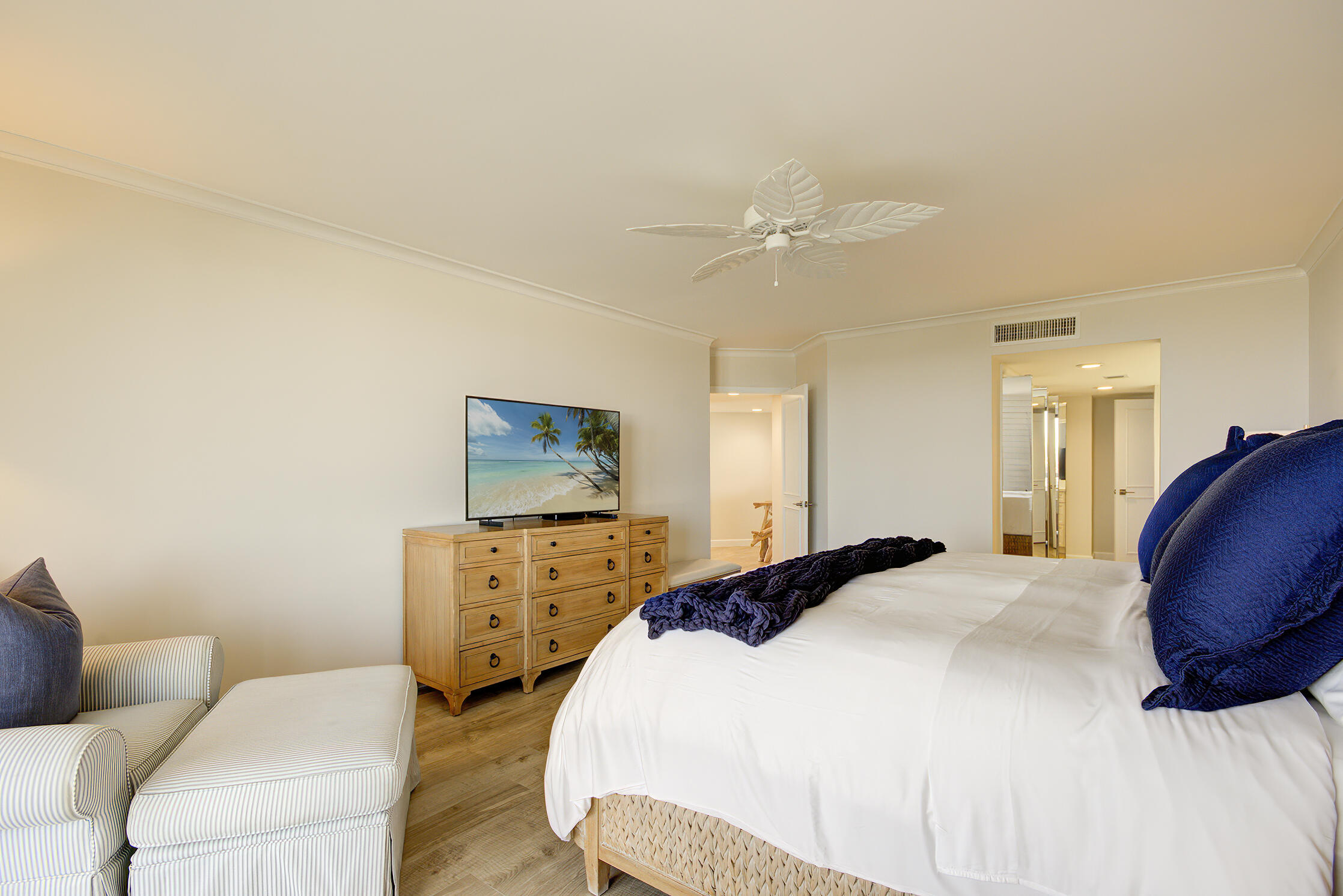 120 South Ocean Boulevard, Unit 4A Delray Beach, FL 33483 - Photo 16 of 36 a bedroom with a bed and dresser