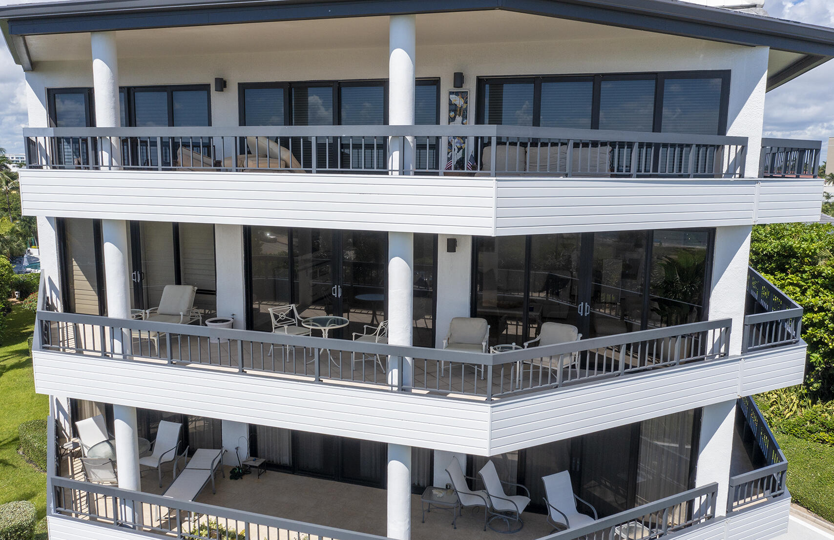 120 South Ocean Boulevard, Unit 4A Delray Beach, FL 33483 - Photo 26 of 36 a front view of a building with glass windows