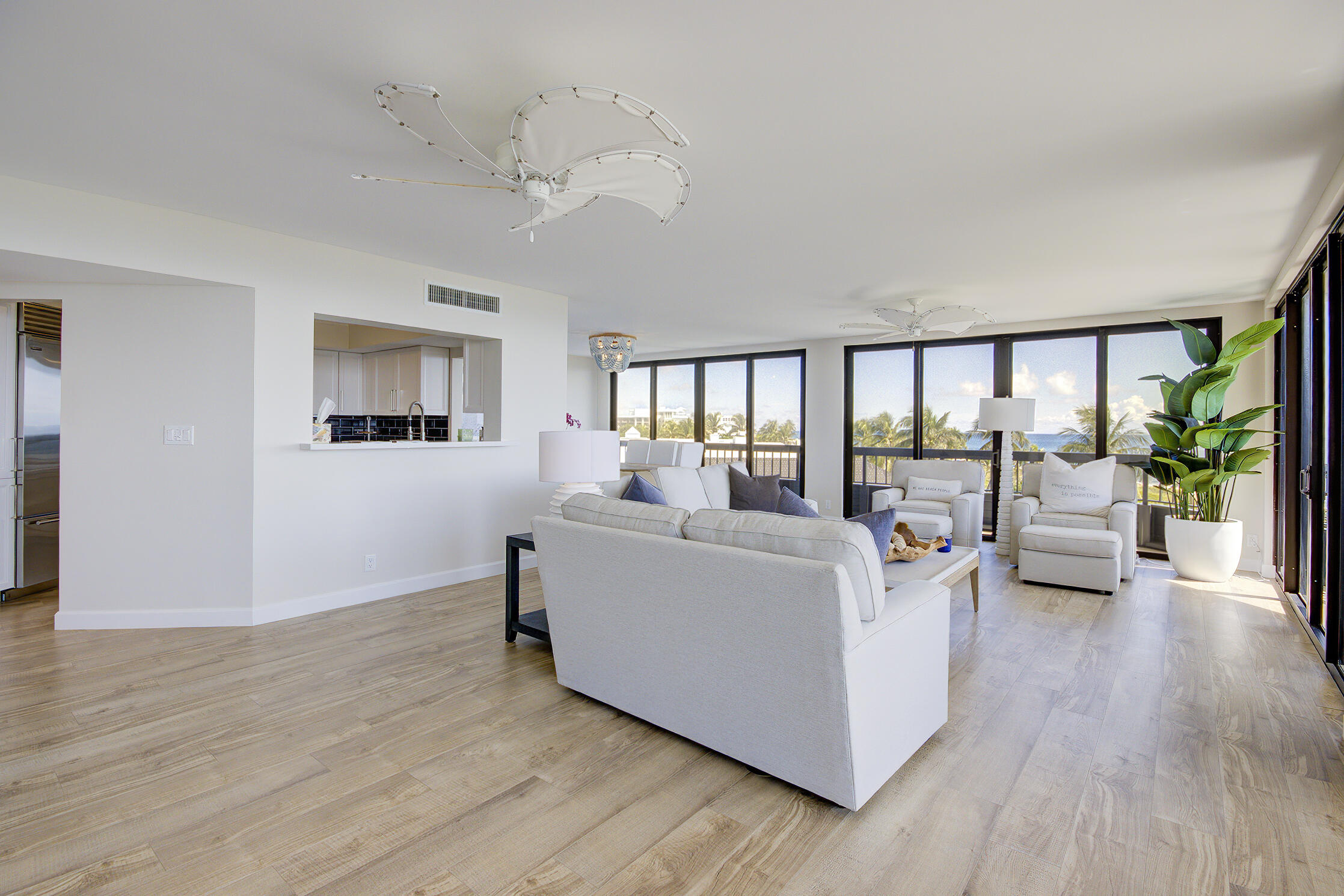 120 South Ocean Boulevard, Unit 4A Delray Beach, FL 33483 - Photo 5 of 36 a living room with furniture and a large window