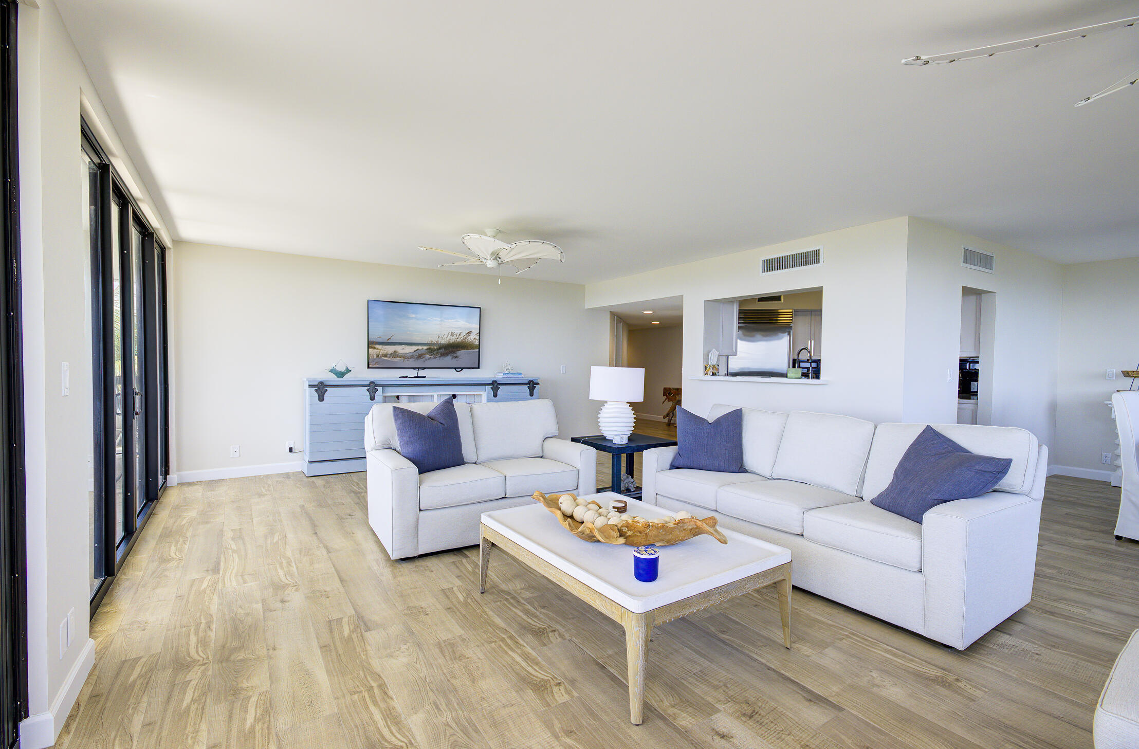 120 South Ocean Boulevard, Unit 4A Delray Beach, FL 33483 - Photo 6 of 36 a living room with furniture and a wooden floor