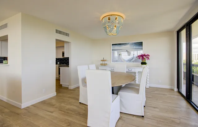 a kitchen with granite countertop stainless steel appliances and wooden cabinets