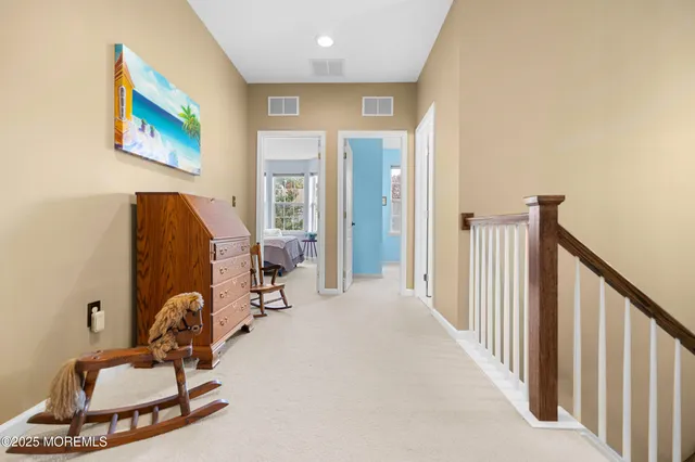 a bedroom with a bed and a table