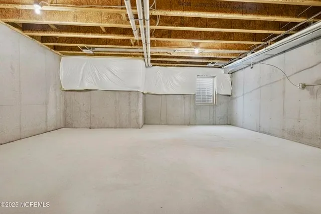 a view of backyard with a garden and outdoor seating