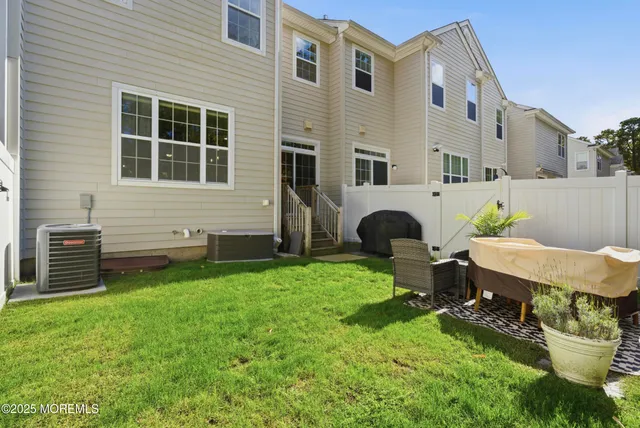a house view with a outdoor seating space