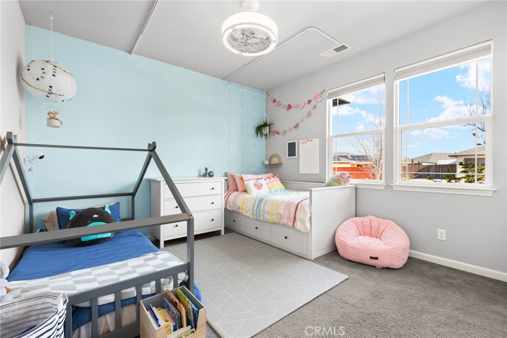 3465 Shaker Lane Chico, CA 95973 - Photo 13 of 34 a bedroom with furniture and a window