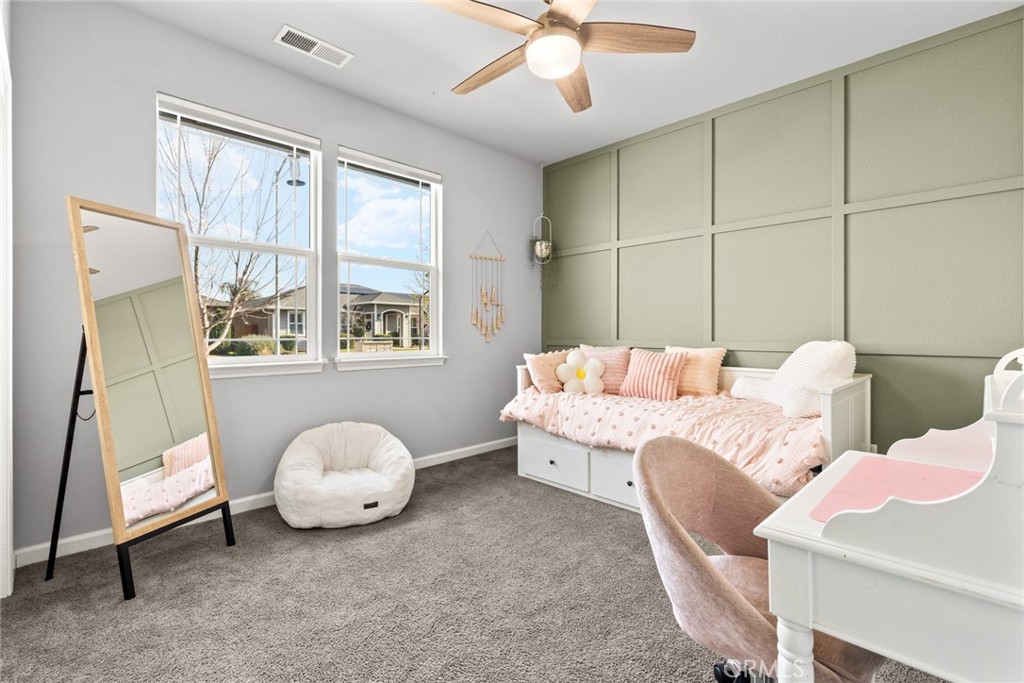 3465 Shaker Lane Chico, CA 95973 - Photo 14 of 34 a living room with furniture and a window