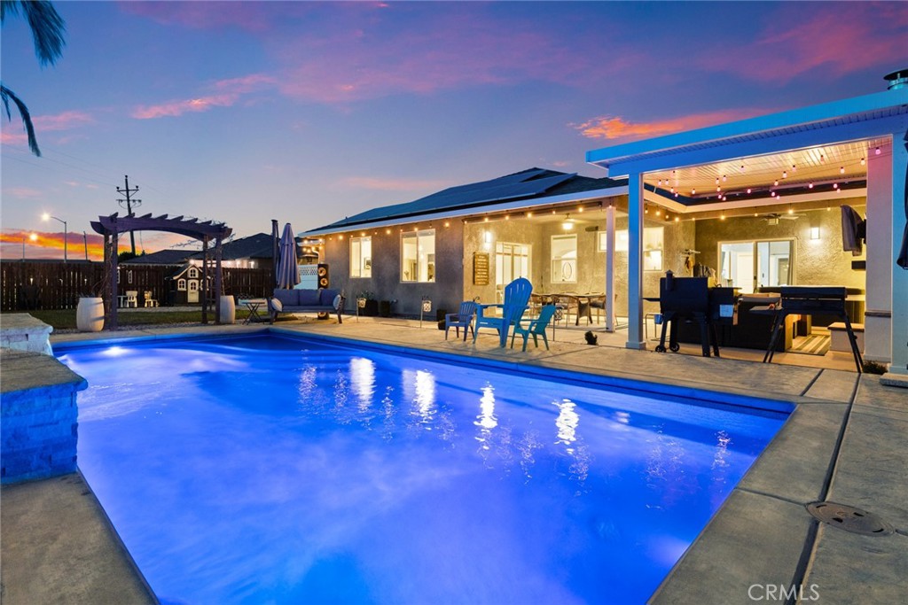 3465 Shaker Lane Chico, CA 95973 - Photo 21 of 34 a view of a swimming pool with outdoor seating