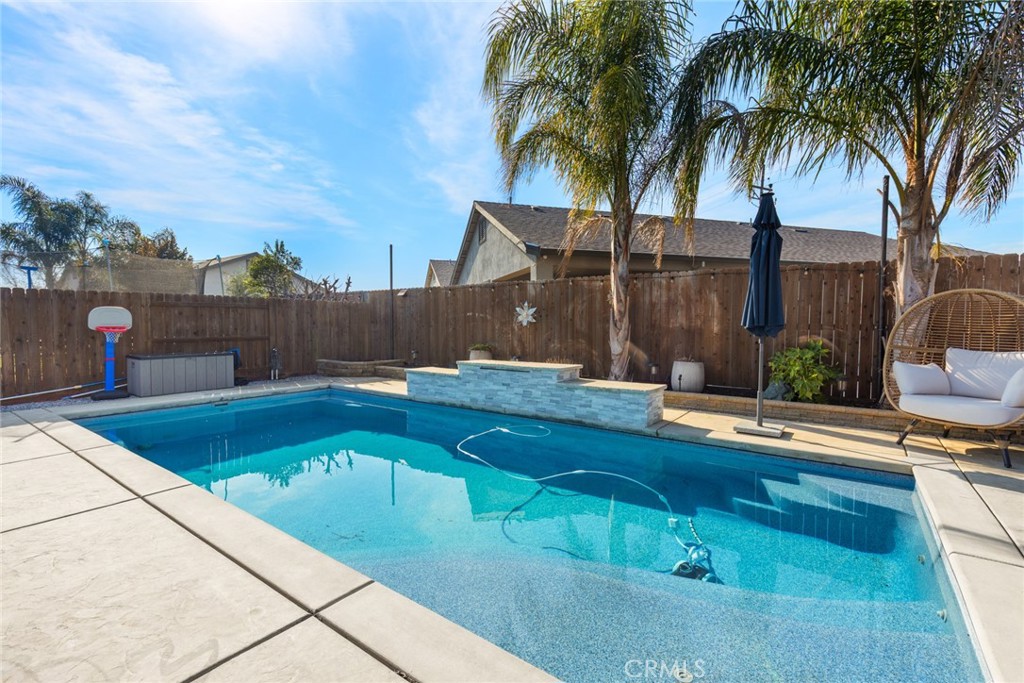 3465 Shaker Lane Chico, CA 95973 - Photo 22 of 34 a view of swimming pool with seating area and barbeque oven