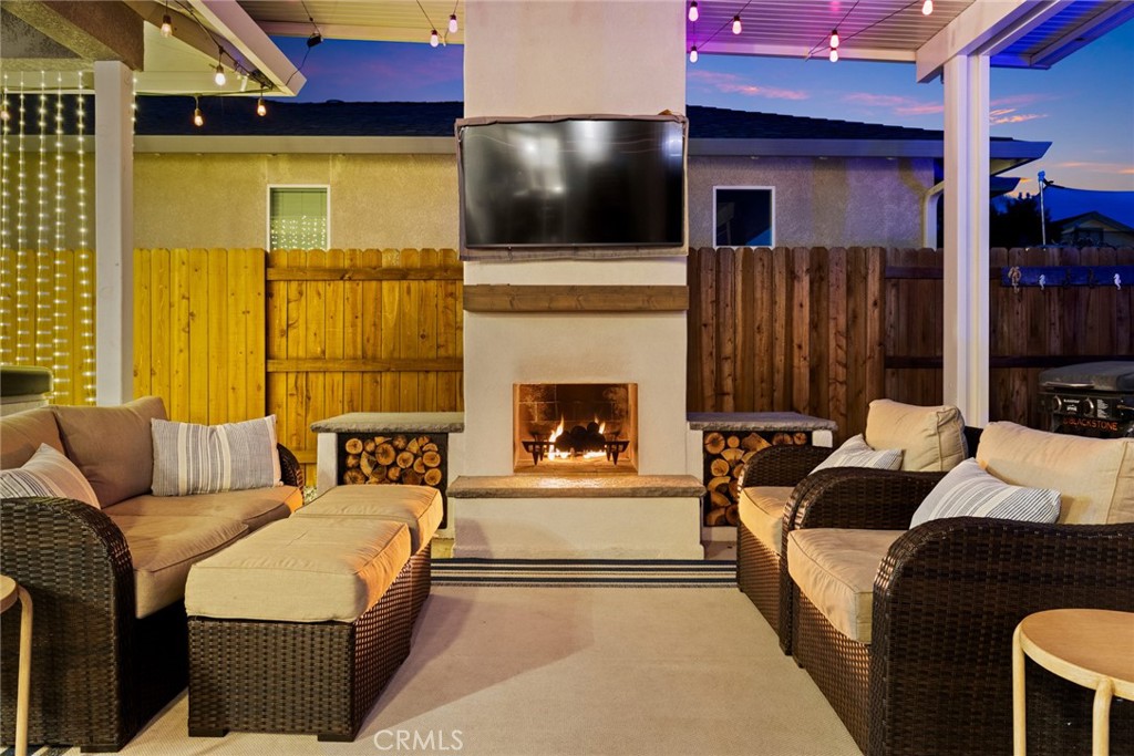 3465 Shaker Lane Chico, CA 95973 - Photo 28 of 34 a living room with furniture and a flat screen tv