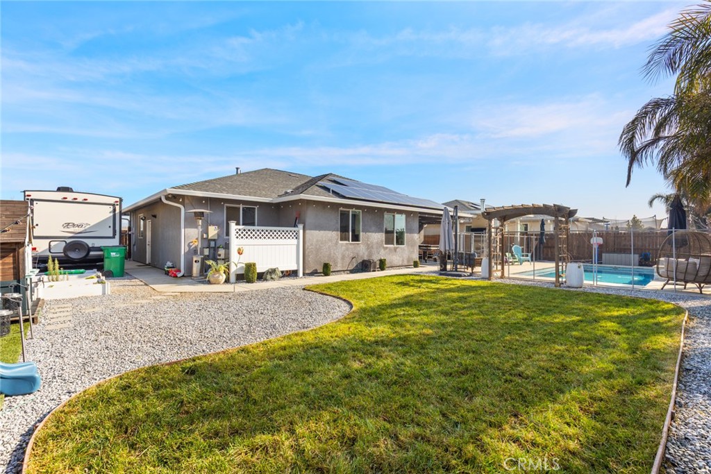 3465 Shaker Lane Chico, CA 95973 - Photo 30 of 34 a front view of a house with swimming pool having outdoor seating