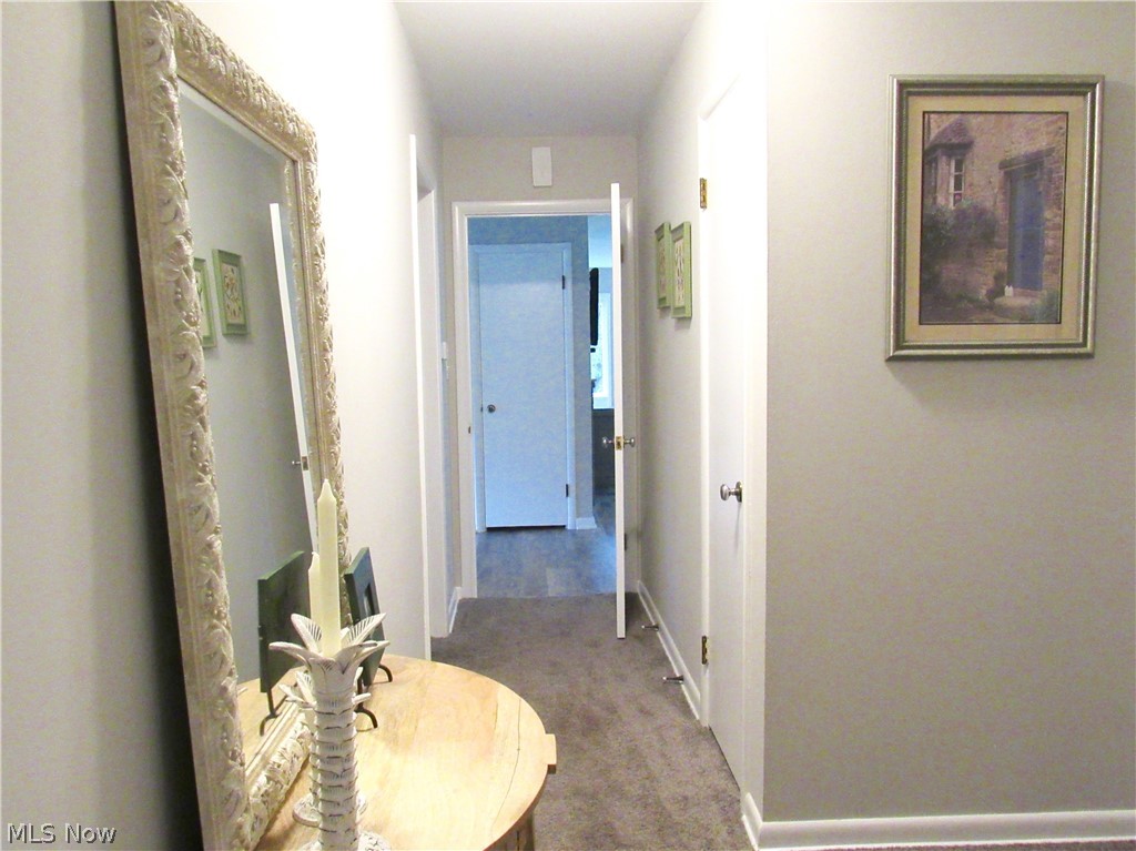 81 Kenridge Road Akron, OH 44333 - Photo 14 of 30 Hallway to the bedrooms with newer interior paint.