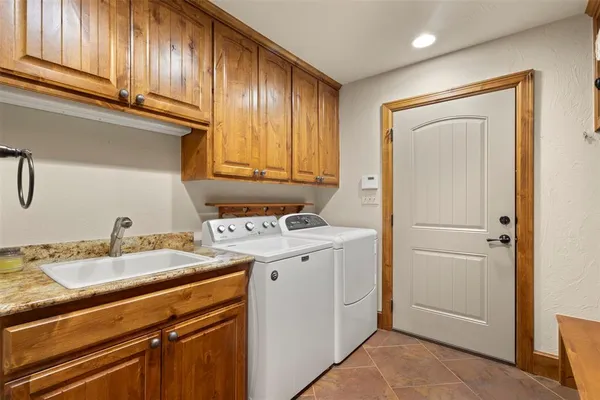 a view of utility room with washer and dryer
