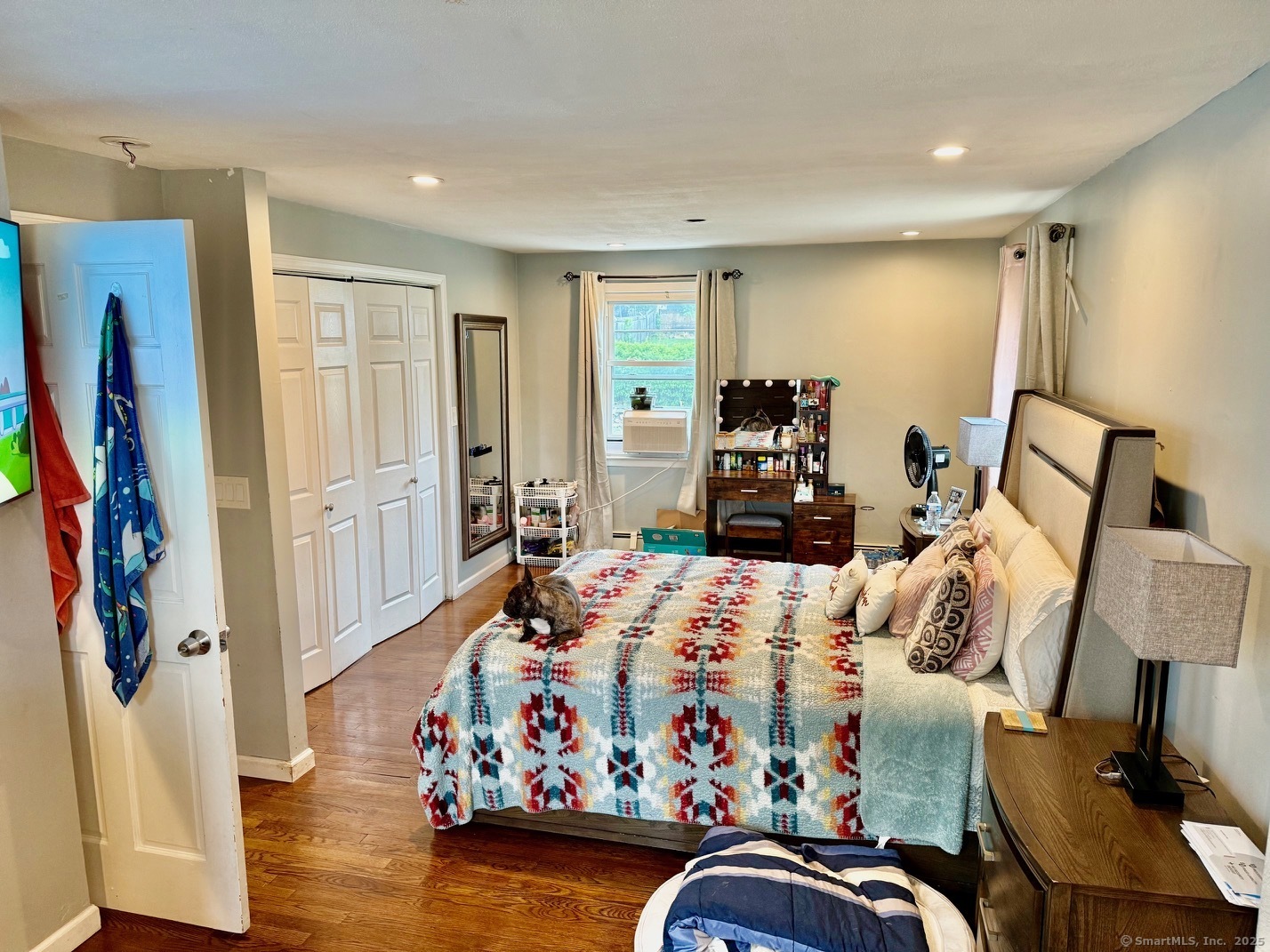 15 Edwards Street Bridgeport, CT 06606 - Photo 24 of 33 a bed room with furniture and a flat screen tv