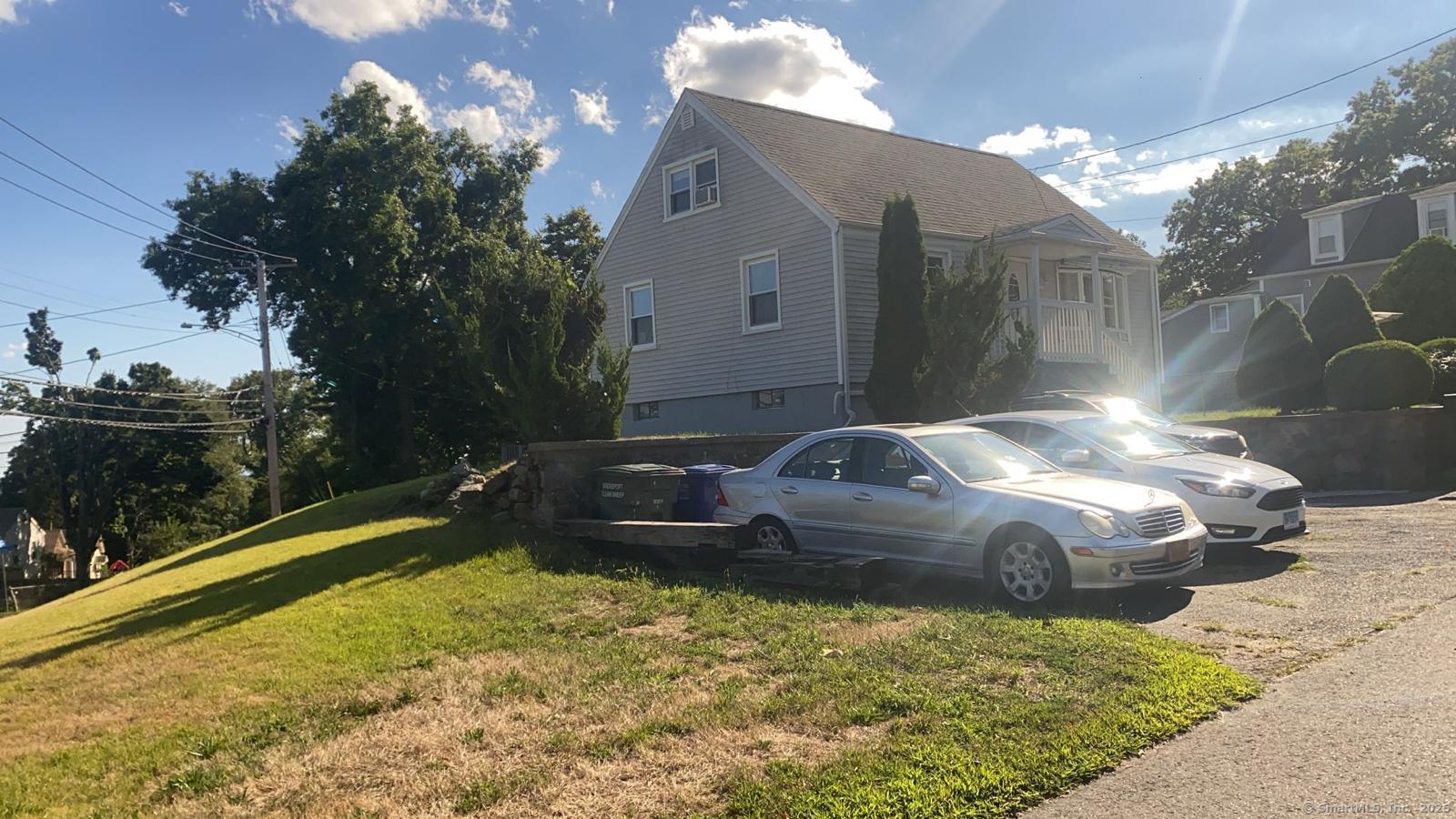 15 Edwards Street Bridgeport, CT 06606 - Photo 27 of 33 a front view of a house with swimming pool