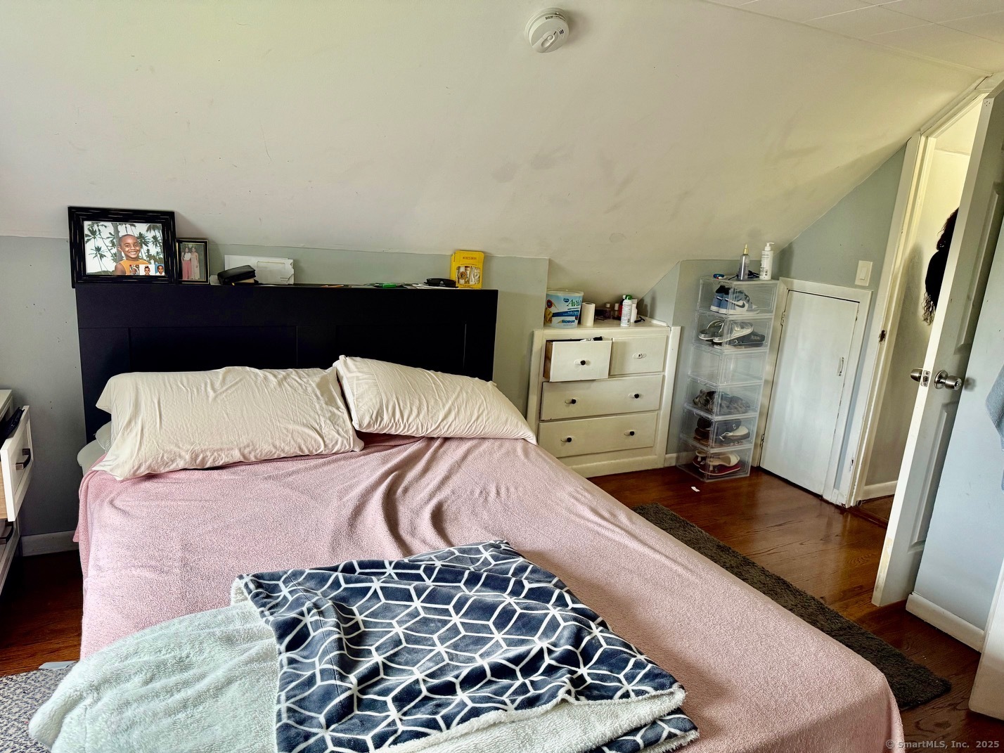 15 Edwards Street Bridgeport, CT 06606 - Photo 6 of 33 a bed room with a bed and a couch