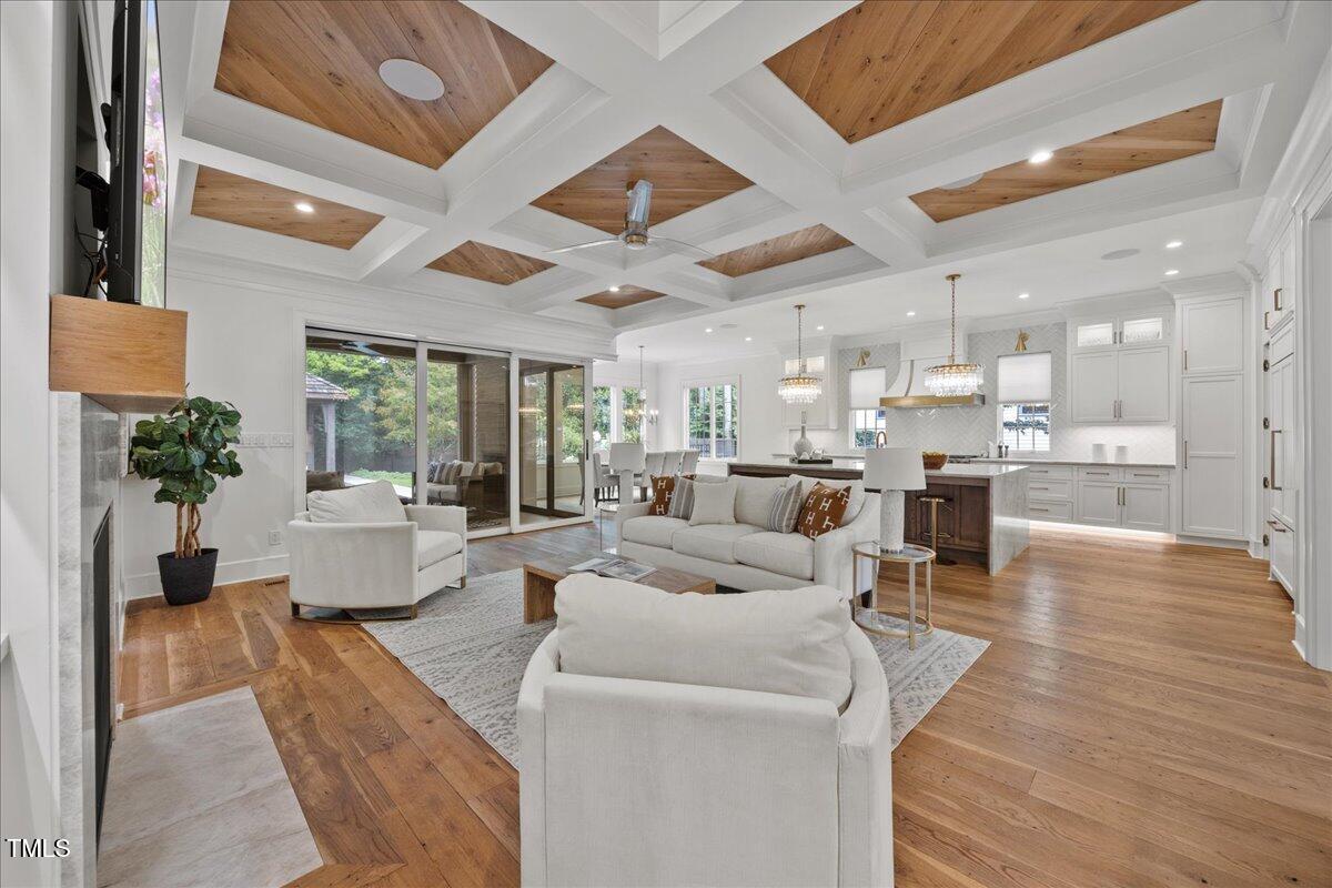 2120 Kipawa Street Raleigh, NC 27607 - Photo 13 of 77 a living room with furniture and a wooden floor