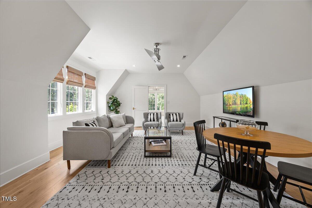 2120 Kipawa Street Raleigh, NC 27607 - Photo 43 of 77 a living room with furniture and a window