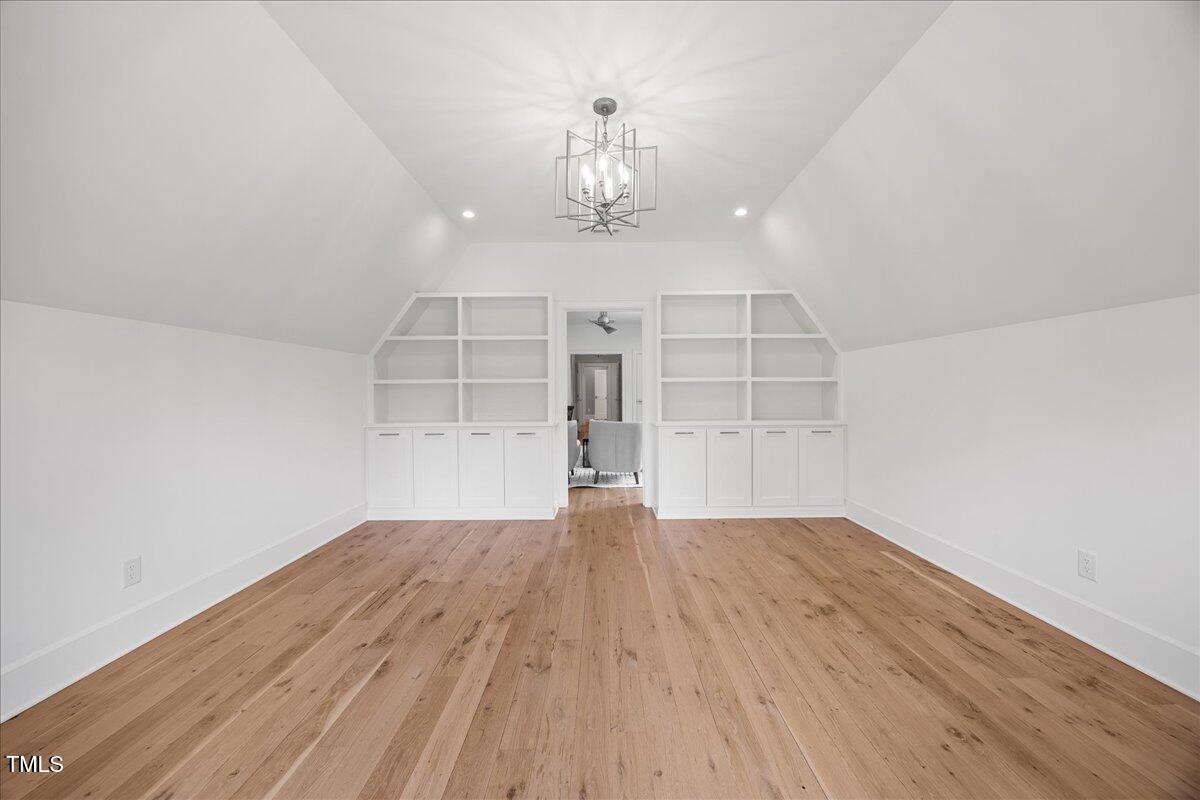 2120 Kipawa Street Raleigh, NC 27607 - Photo 47 of 77 wooden floor in an empty room with a window